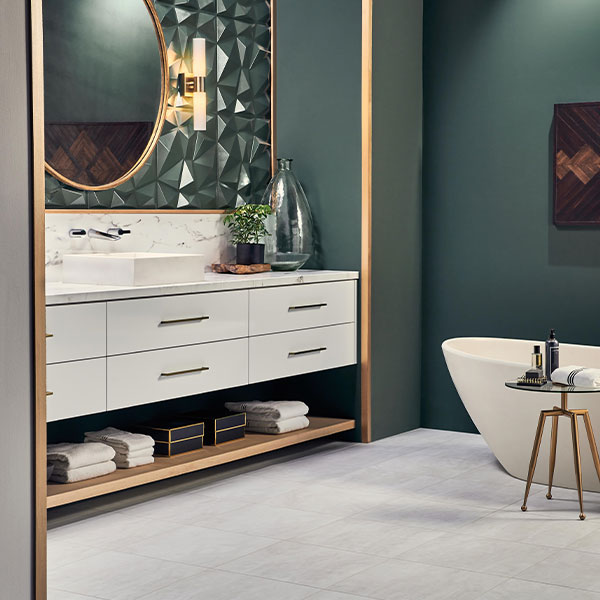 vinyl tile flooring in bathroom with emerald green accent wall